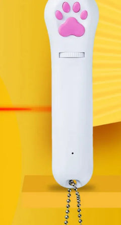 White remote control with pink paw print on a yellow background