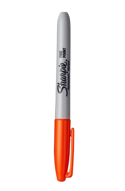 Orange Sharpie marker with Chinese text on an orange background
