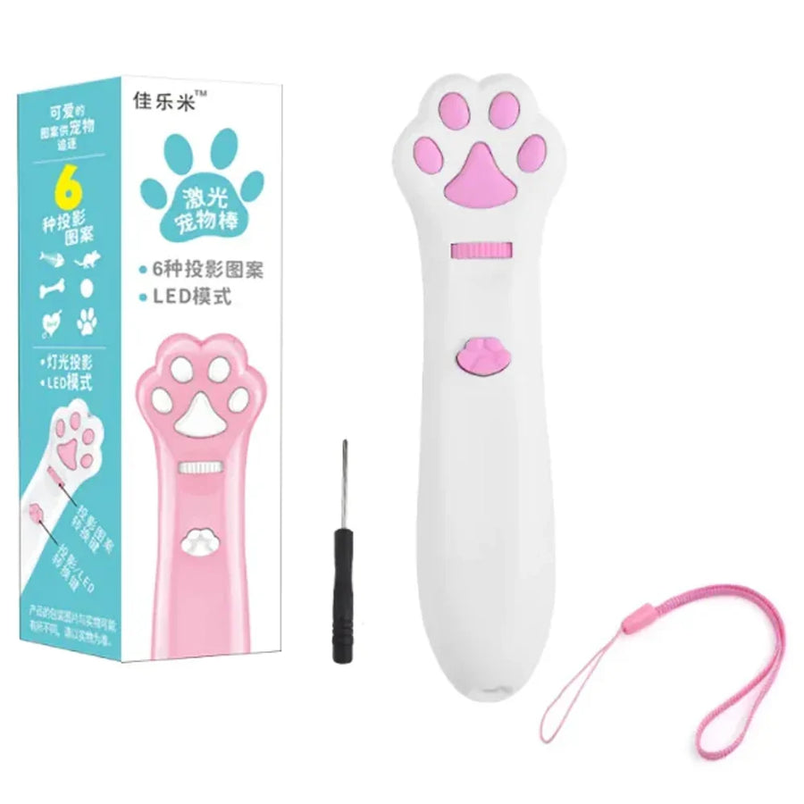 Pink and white paw-shaped device with a remote control and lanyard, next to its packaging on a white background.