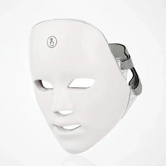 White LED face mask on a light gray background
