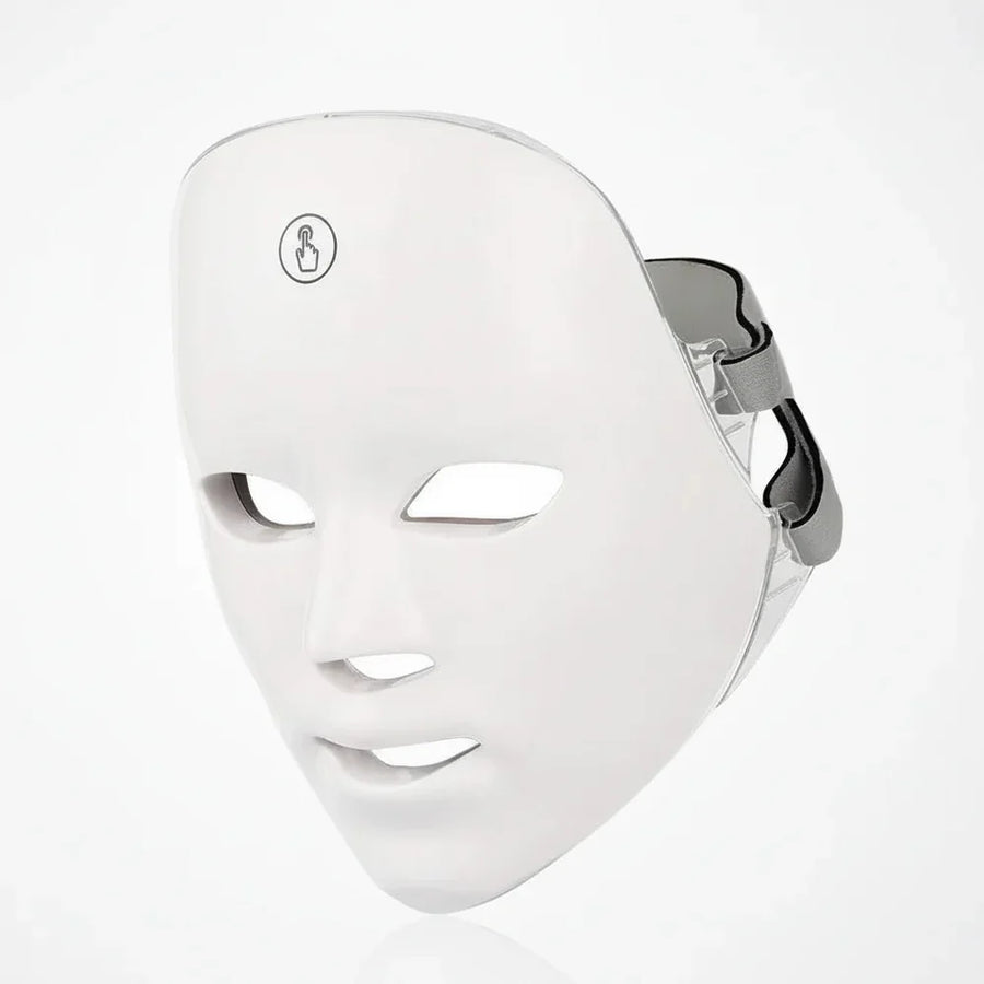 White LED face mask on a light gray background