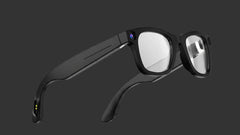 Black smart glasses on a light gray background