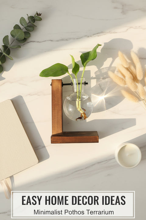 Glass vase with plant on a wooden stand on a table with a book and newspaper in the background