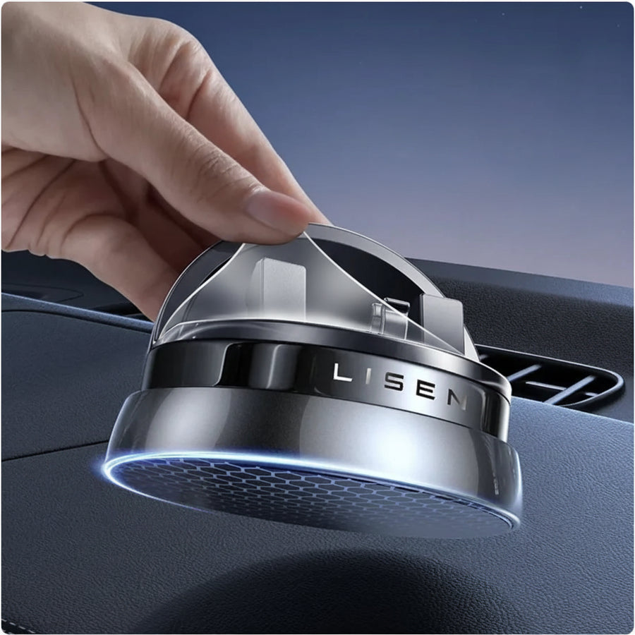 Car air freshener being installed into a car's air vent with 'LISEN' branding.