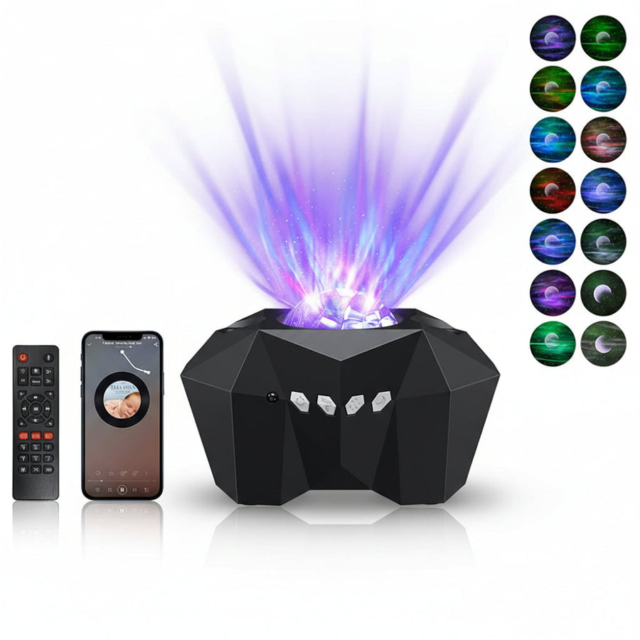 Black geometric projector with colorful light display, remote control, and smartphone app on a white surface.