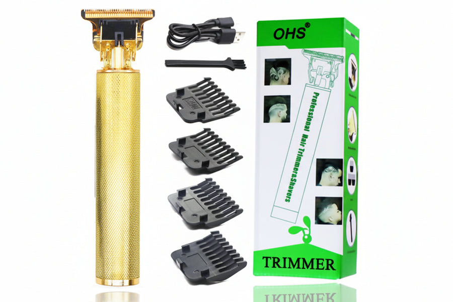 Gold hair trimmer with attachments and packaging on a white background