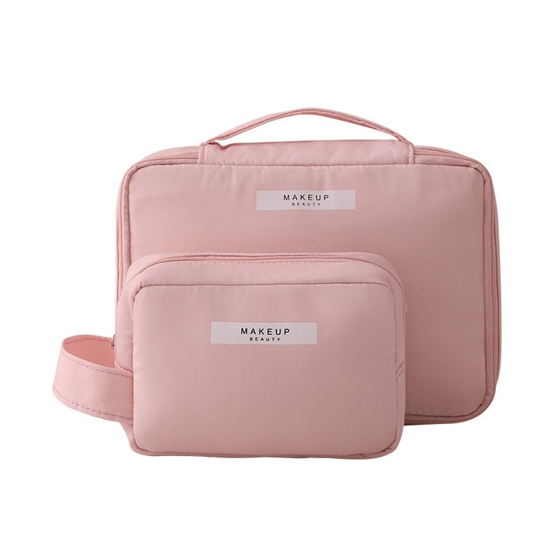 Pink makeup bags with 'MAKEUP BEAUTY' labels on a white background