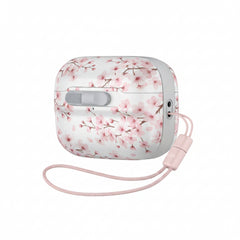 White wireless earbuds case with a lanyard on a white background