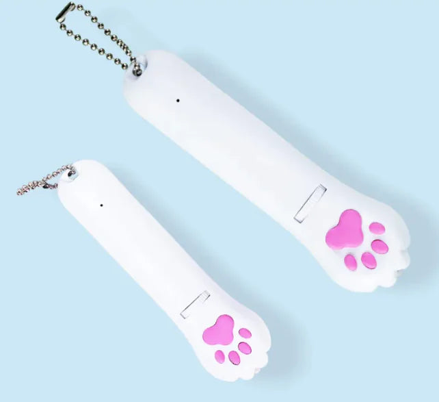 Two white nail polish bottles with pink paw prints on a light blue background