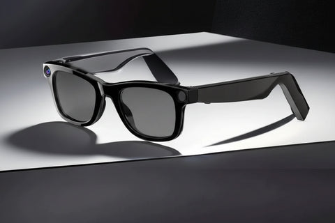 Black sunglasses with blue-tinted lenses on a reflective surface with a dark background